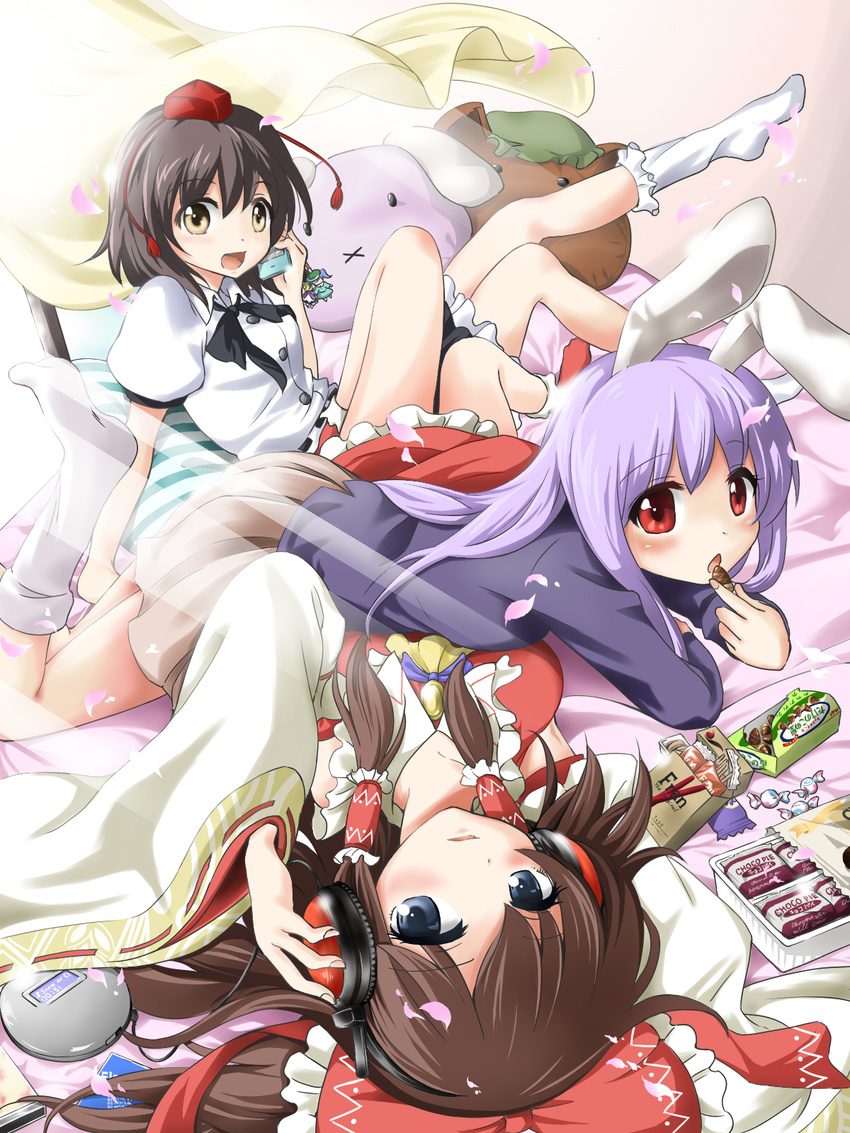 animal_ears blue_eyes bow brown_hair bunny_ears candy cellphone cellphone_charm chocolate detached_sleeves food fuyutarou hair_bow hakurei_reimu hat headphones highres long_hair lying multiple_girls on_back on_stomach phone purple_hair red_eyes reisen_udongein_inaba shameimaru_aya short_hair skirt socks takenoko_no_sato_(food) tokin_hat touhou yellow_eyes