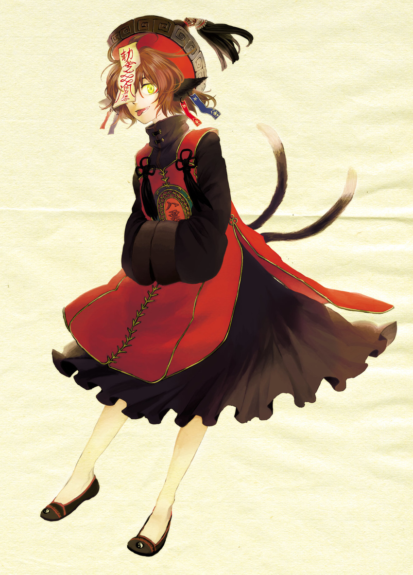 alternate_costume animal_ears bad_id bad_pixiv_id black_footwear cat_ears cat_tail chen earrings flats full_body hands_in_opposite_sleeves hat highres jewelry jiangshi long_sleeves looking_at_viewer multiple_tails ofuda one_eye_covered own_hands_together parted_lips red_hat shoes solo standing sugi tabard tail tassel tongue touhou turtleneck two_tails wide_sleeves yellow_background yellow_eyes yin_yang