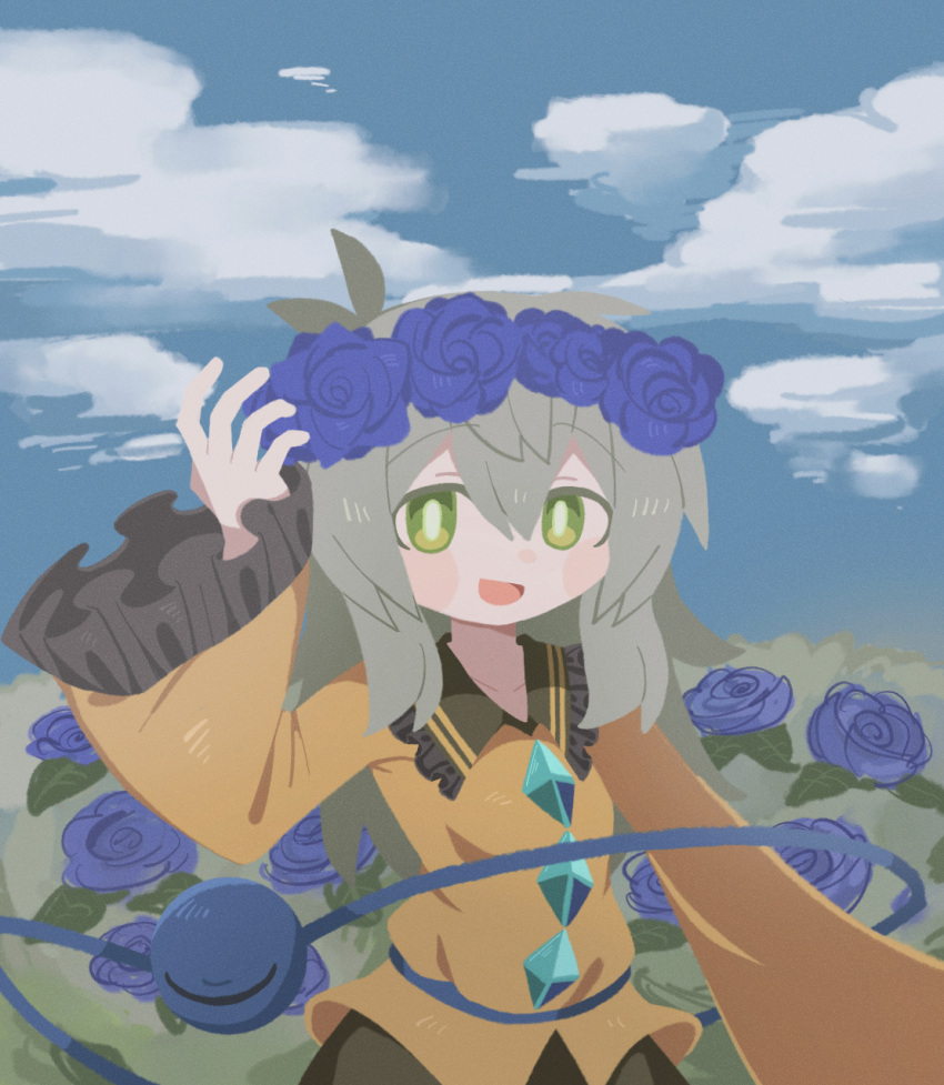 1girl artistic_error blouse blue_flower blue_rose blue_sky blush bright_pupils buttons day diamond_button film_grain flower flower_wreath frilled_shirt_collar frilled_sleeves frills green_eyes green_skirt hair_between_eyes hand_up hat highres komeiji_koishi long_sleeves looking_at_viewer medium_hair no_headwear no_lineart no_sclera open_mouth outdoors rose shirt skirt sky smile solo touhou upper_body wide_sleeves yellow_shirt zunusama