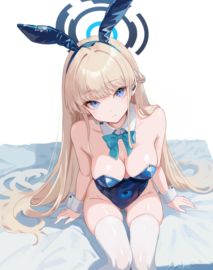 1girl absurdres animal_ears bare_shoulders bed_sheet blonde_hair blue_archive blue_bow blue_bowtie blue_eyes blue_halo blue_leotard bow bowtie closed_mouth commentary_request detached_collar fake_animal_ears halo highres leotard long_hair looking_at_viewer official_alternate_costume official_alternate_hairstyle on_bed playboy_bunny rabbit_ears simple_background sitting solo strapless strapless_leotard thighhighs toki_(blue_archive) toki_(bunny)_(blue_archive) tomo_527 white_background white_thighhighs white_wrist_cuffs wrist_cuffs