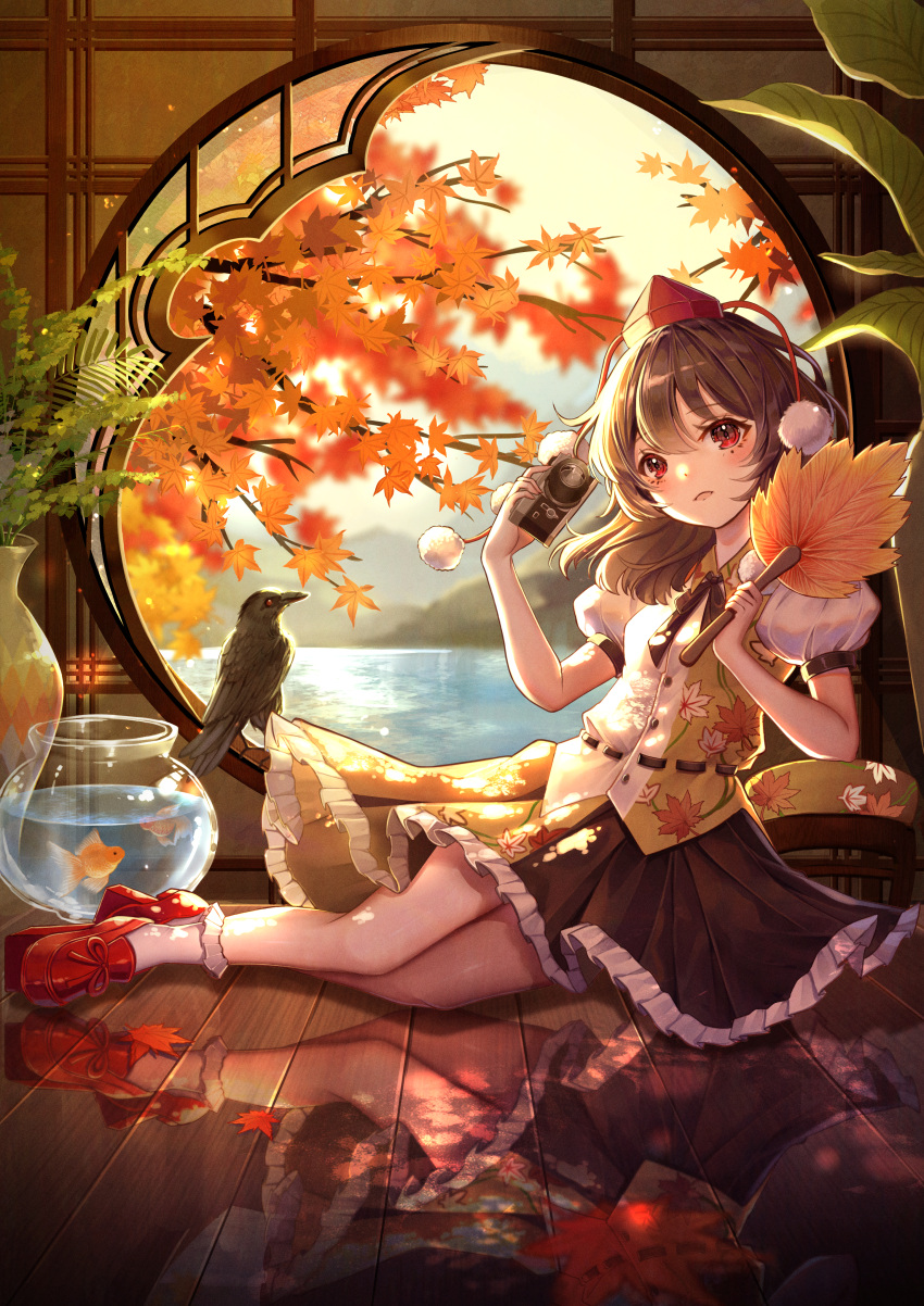 1girl absurdres arua autumn_leaves bird black_bow black_bowtie blurry bow bowtie camera crow depth_of_field fish fishbowl geta goldfish hat hauchiwa highres holding holding_camera leaf leaf_print long_hair maple_leaf open_mouth plant pom_pom_(clothes) potted_plant puffy_short_sleeves puffy_sleeves red_eyes red_hat reflective_floor shameimaru_aya short_sleeves skirt smile solo tengu-geta tokin_hat touhou vase water window