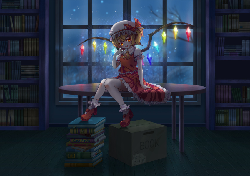 1girl ascot blonde_hair book bookshelf crystal_wings dress flandre_scarlet full_body hand_up hat hat_ribbon indoors kashi_kosugi looking_at_viewer mary_janes mob_cap night open_mouth red_dress red_eyes red_ribbon ribbon shoes sitting sitting_on_table smile solo table touhou yellow_ascot