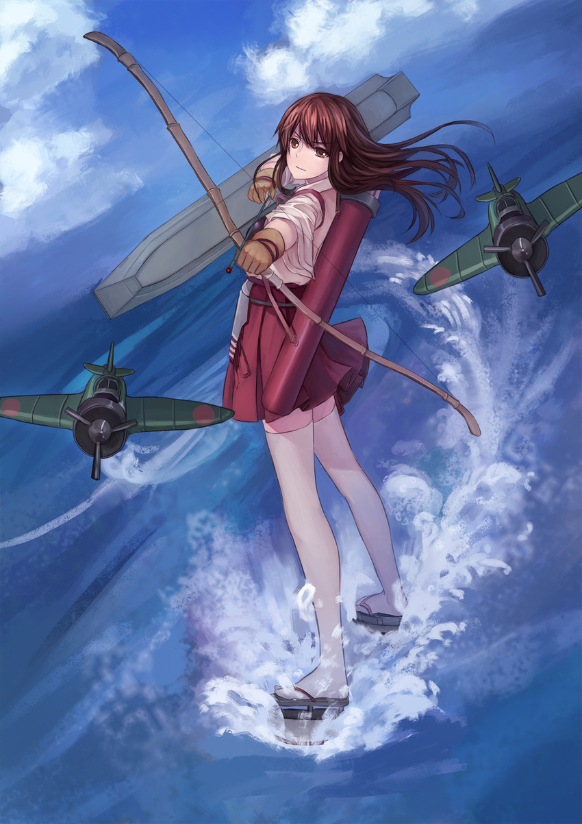 aiming aiming_at_viewer aircraft airplane akagi_(kantai_collection) archery arrow blue_sky bow_(weapon) brown_eyes brown_hair cloud day drawing_bow flight_deck full_body gloves hakama_skirt highres kantai_collection long_hair looking_at_viewer muneate ocean outdoors partly_fingerless_gloves pleated_skirt quiver red_skirt skirt sky solo standing tasuki thighhighs weapon white_legwear youxuemingdie yugake zettai_ryouiki