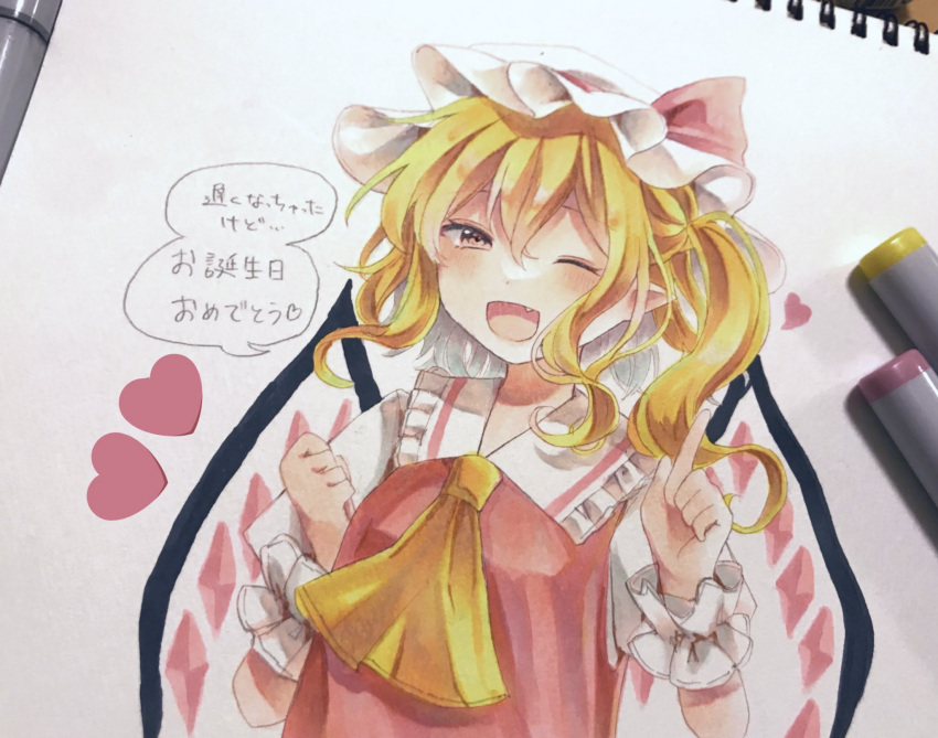 1girl :d ;d art_tools_in_frame ascot blonde_hair blush collared_shirt commentary_request crystal crystal_wings fang flandre_scarlet frilled_shirt_collar frilled_wrist_cuffs frills furawast hat hat_ribbon heart highres looking_at_viewer mob_cap one_eye_closed one_side_up photo_(medium) pointy_ears red_eyes red_vest ribbon shirt smile solo speech_bubble spoken_heart touhou traditional_media translation_request upper_body vest white_hat white_shirt white_wrist_cuffs wings wrist_cuffs yellow_ascot