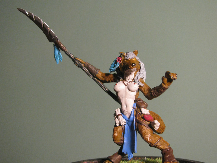 barbarian big_breasts breasts brown_fur canine clothing commissar_danno_(artist) feather female fur grey_hair hair loincloth mammal miniature model nipples photo polearm pouch real reaper_miniatures scroll sculpture solo spear weapon were werewolf white_fur wolf yellow_eyes