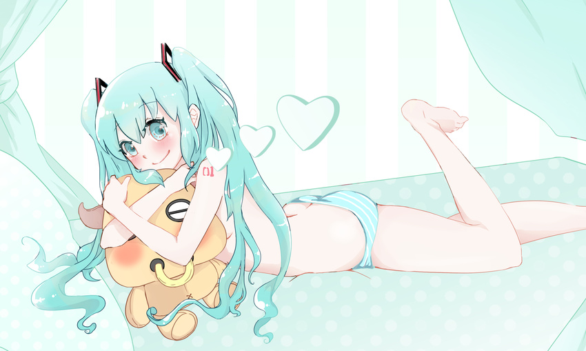 aqua_hair barefoot blush butt_crack eyebrows_visible_through_hair green_eyes hair_between_eyes hatsune_miku heart highres legs long_hair lying mou_niu on_stomach panties smile solo striped striped_panties stuffed_animal stuffed_toy toes topless twintails underwear underwear_only vocaloid