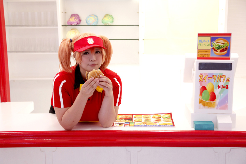 1girl asian bow bowtie brand_name_imitation brown_eyes brown_hair chouzuki_maryou cosplay eating employee_uniform fast_food fast_food_uniform food hamburger hataraku_maou-sama! photo plump polo_shirt ribbon sasaki_chiho sasaki_chiho_(cosplay) short_hair short_twintails simple_background skirt solo twintails uniform visor_cap