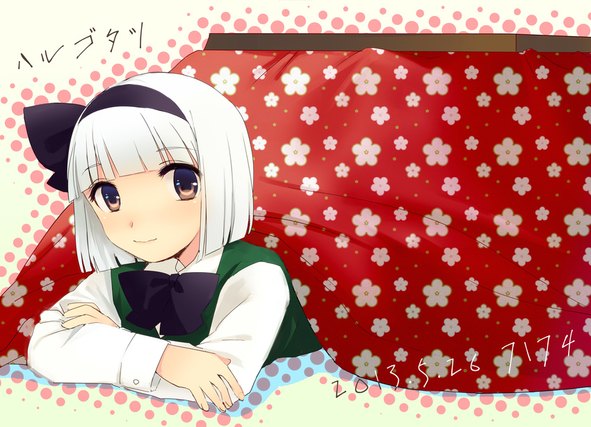 74_(teduka) absurdres bow brown_eyes hair_bow highres konpaku_youmu kotatsu lying on_stomach silver_hair solo table touhou