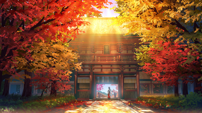 1girl architecture autumn autumn_leaves black_hair bush copyright_notice dappled_sunlight east_asian_architecture evening facing_away falling_leaves from_behind gate hakama highres japanese_clothes kimono leaf long_hair miko mountain official_art original outdoors pavement red_hakama scenery shrine sky smile_(qd4nsvik) solo standing sunlight tree white_kimono