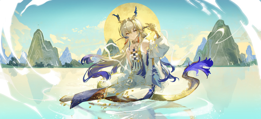 1girl absurdres arknights arm_up bare_shoulders blonde_hair caustics celina chinese_commentary closed_mouth commentary_request day dragon_girl dragon_horns dragon_tail earrings floating_hair grey_eyes grey_hair hair_between_eyes hair_intakes highres horns jacket jewelry lake long_hair long_sleeves looking_at_viewer magic mountain multicolored_hair necklace off_shoulder open_clothes open_jacket outdoors pants pointy_ears purple_hair purple_horns purple_tail reflection shu_(arknights) sitting smile solo strapless sun tail tube_top white_jacket white_pants white_tube_top wide_shot yellow_horns yellow_tail