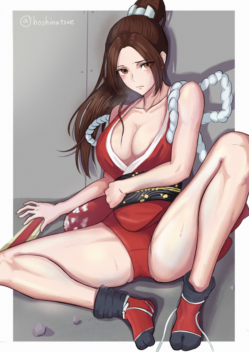 1girl bare_shoulders black_socks breasts brown_eyes brown_hair cleavage collarbone fatal_fury hand_fan high_ponytail highres hoshinatsue japanese_clothes kimono looking_at_viewer red_kimono revealing_clothes shiranui_mai sitting socks solo tabi the_king_of_fighters the_king_of_fighters_xv thighs twitter_username