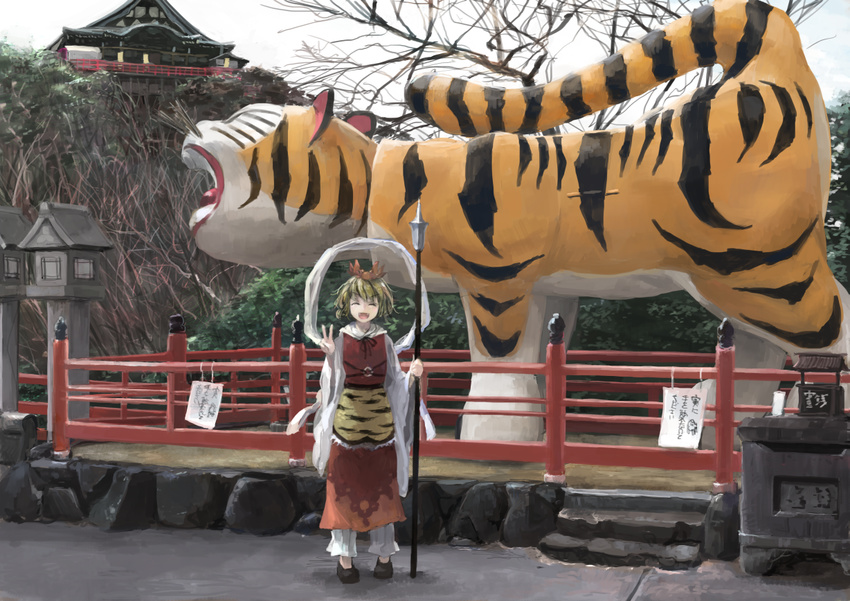 animal_print bishamonten's_spear blonde_hair chougosonshi-ji closed_eyes hair_ornament ichiba_youichi landmark long_sleeves multicolored_hair open_mouth pose real_world_location shawl shirt sign skirt smile solo statue streaked_hair temple tiger tiger_print toramaru_shou touhou v wide_sleeves