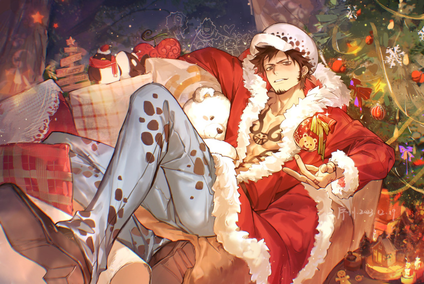 1boy black_footwear black_hair chest_tattoo christmas_ornaments christmas_tree couch dated devil_fruit earrings facial_hair gingerbread_man goatee hand_tattoo hat highres jewelry jyukawa looking_at_viewer male_focus on_couch one_piece open_clothes pants pillow santa_costume short_hair sideburns signature solo star_(symbol) stuffed_animal stuffed_toy tattoo teddy_bear toned toned_male trafalgar_law