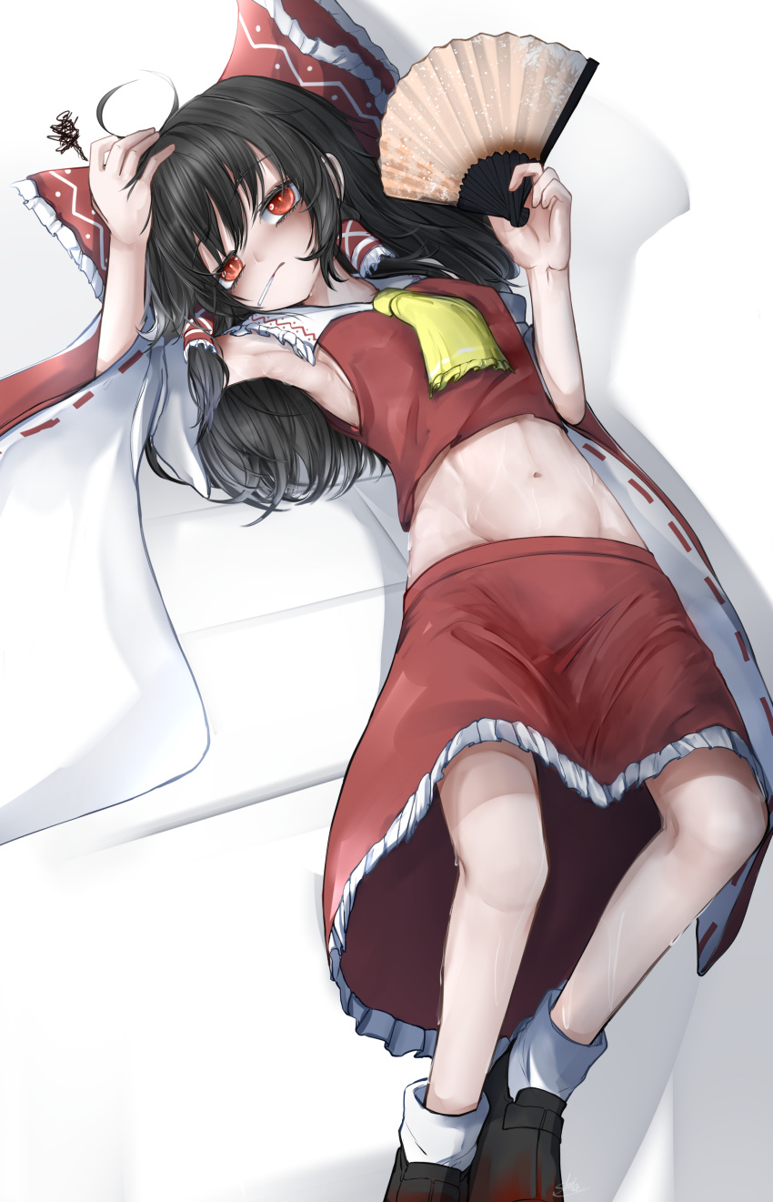 1girl absurdres armpits ascot black_footwear black_hair bow candy collar collared_shirt detached_sleeves folding_fan food frilled_bow frilled_hair_tubes frilled_skirt frills groin hair_bow hair_tubes hakurei_reimu hand_fan highres itanase lollipop long_hair midriff navel red_bow red_eyes red_shirt red_skirt shirt simple_background skirt sleeveless sleeveless_shirt socks solo sweat touhou watermark white_collar white_sleeves white_socks yellow_ascot