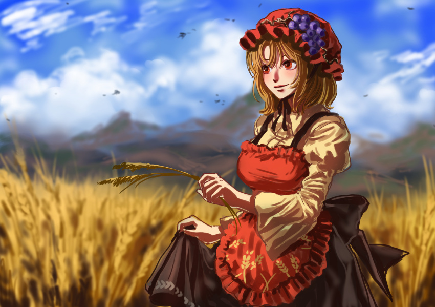 1girl aki_minoriko apron blonde_hair blurry blurry_background frilled_hat frills fruit_hat_ornament grape_hat_ornament hat highres holding holding_wheat kuya_(hey36253625) lifted_by_self outdoors red_apron red_eyes red_hat shirt short_hair smile solo touhou wheat_field yellow_shirt