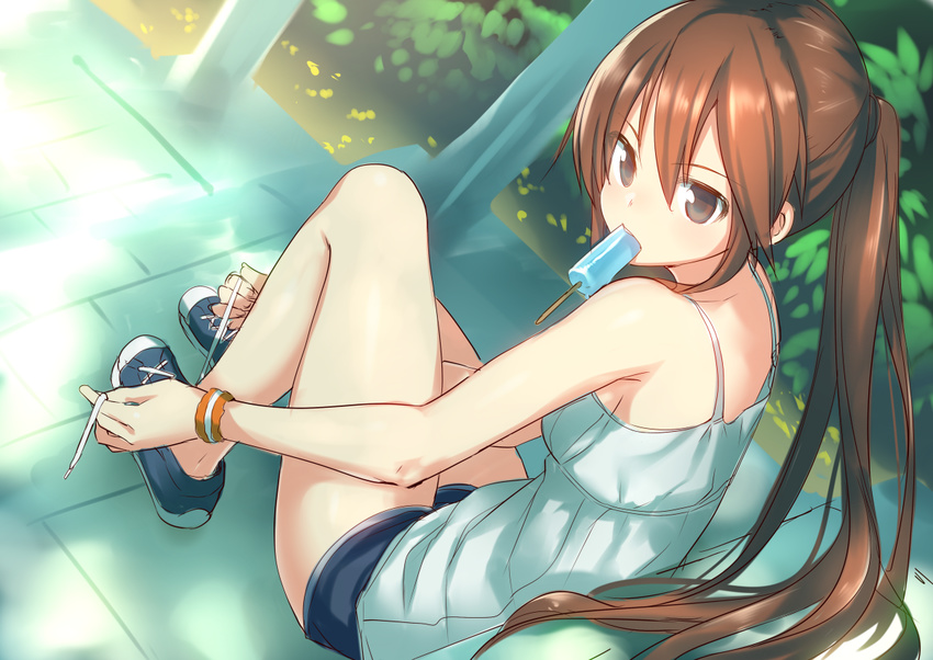 bare_legs bare_shoulders brown_eyes brown_hair food food_in_mouth from_behind hiraga_matsuri long_hair looking_back mouth_hold original ponytail popsicle shoes shorts sitting sneakers solo tying_shoes very_long_hair