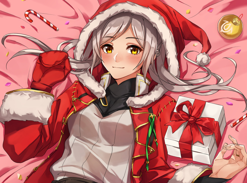 1girl adapted_costume blush box candy candy_cane christmas_ornaments closed_mouth female_my_unit_(fire_emblem:_kakusei) fire_emblem fire_emblem:_kakusei food fur_trim gift gift_box grey_hair hat kamu_(kamuuei) long_sleeves lying mittens my_unit_(fire_emblem:_kakusei) nintendo on_back pom_pom_(clothes) red_hat red_mittens santa_hat smile solo twintails upper_body