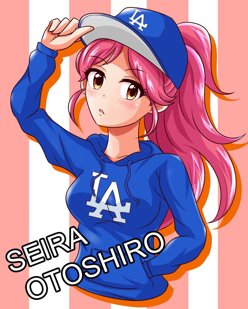 1girl aikatsu! aikatsu!_(series) baseball_cap blue_hoodie blush breasts brown_eyes character_name cropped_torso drawstring drop_shadow ginmugi hand_in_pocket hand_on_headwear hat head_tilt highres hood hood_down logo long_hair looking_at_viewer los_angeles_dodgers major_league_baseball medium_breasts otoshiro_seira parted_lips pink_hair ponytail solo striped striped_background translation_request upper_body very_long_hair