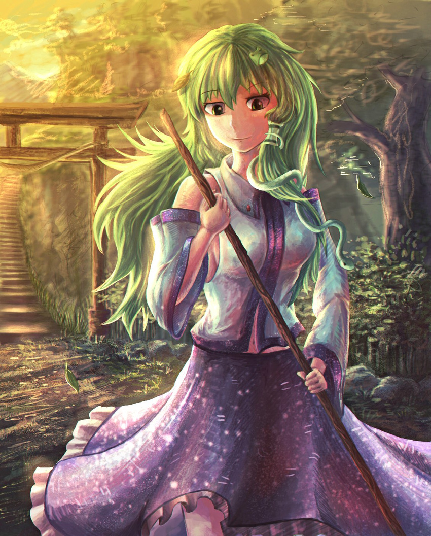 blue_skirt blue_vest blush breasts broom bush commentary detached_sleeves falling_leaves fly-gray frog frog_hair_ornament green_eyes green_hair hair_ornament highres japanese_clothes kochiya_sanae leaf leaf_on_head light_smile long_hair looking_down medium_breasts miko navel pan-ooh plant sideboob skirt smile snake solo stairs sunlight torii touhou tree very_long_hair vest