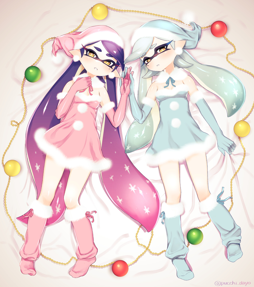 absurdres aori_(splatoon) bangs bauble bed_sheet blue_dress blue_gloves blue_hair blue_hat blue_legwear blue_ribbon blue_santa_costume blush christmas christmas_ornaments cousins detached_collar domino_mask dress earrings full_body fur_trim gloves gradient_hair hat highres holding_hands hotaru_(splatoon) jewelry leg_warmers long_hair looking_at_viewer lying mask mole mole_under_eye multicolored_hair multiple_girls no_shoes on_back pink_dress pink_gloves pink_hair pink_hat pink_legwear pink_ribbon pink_santa_costume pointy_ears puchiman purple_hair ribbon santa_costume santa_hat smile splatoon_(series) splatoon_1 strapless strapless_dress swept_bangs tentacle_hair twitter_username very_long_hair yellow_eyes