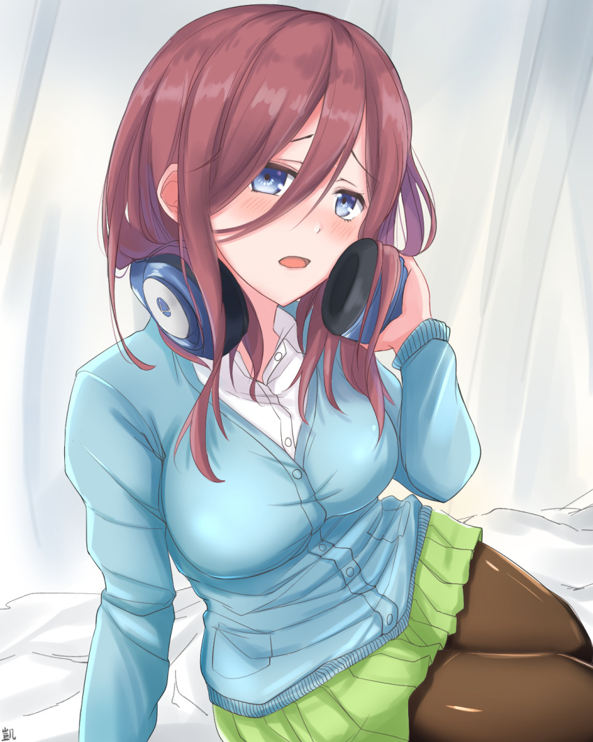 1girl bangs black_legwear blue_cardigan blue_eyes blush breasts brown_hair cardigan go-toubun_no_hanayome green_skirt hair_between_eyes hand_on_headphones headphones headphones_around_neck heckler_kai highres large_breasts long_sleeves looking_at_viewer medium_hair nakano_miku open_mouth pantyhose shirt sitting skirt solo white_shirt