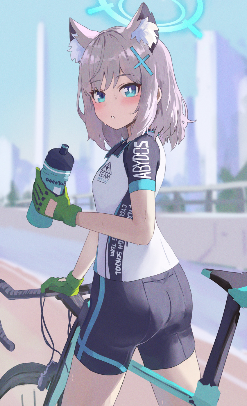 1girl :o animal_ear_fluff animal_ears ass bicycle bike_jersey bike_shorts black_shorts blue_archive blue_eyes blue_halo blurry blurry_background blush bright_pupils clip_studio_paint_(medium) cowboy_shot day gloves green_gloves grey_hair hair_ornament halo hand_up highres holding holding_thermos jersey looking_at_viewer making-of_available medium_hair mismatched_pupils official_alternate_costume outdoors parted_lips road ryoha_kosako shiroko_(blue_archive) shiroko_(cycling)_(blue_archive) shirt short_sleeves shorts sidelocks solo standing sweat thermos video_thumbnail white_pupils white_shirt wolf_ears wolf_girl x_hair_ornament