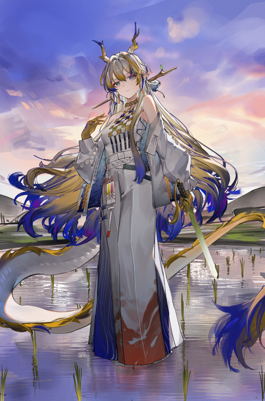 1girl absurdres arknights bare_shoulders beads belt blonde_hair closed_mouth dragon_girl dragon_horns dragon_tail earrings evening flantia floating floating_hair full_body grey_eyes grey_hair grey_horns grey_tail hair_between_eyes hair_intakes hand_up highres holding holding_sword holding_weapon horns jacket jewelry light_smile long_hair long_sleeves looking_at_viewer multicolored_hair necklace off_shoulder open_clothes open_jacket outdoors pants plant pointy_ears purple_hair purple_horns purple_tail reflection reflective_water seigaiha shu_(arknights) solo standing strapless sword tail tube_top unfinished unzipped very_long_hair water wavy_hair weapon white_belt white_jacket white_pants white_tail white_tube_top yellow_horns yellow_tail zipper