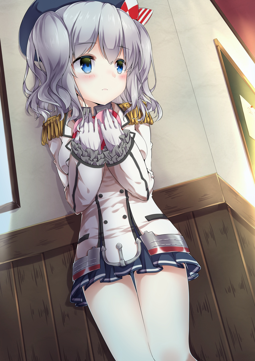 absurdres amane_tari beret blue_eyes blush box commentary_request epaulettes frilled_sleeves frills gloves grey_skirt hat heart heart-shaped_box highres kantai_collection kashima_(kantai_collection) military military_uniform pleated_skirt sidelocks silver_hair skirt solo twintails uniform valentine wavy_hair white_gloves