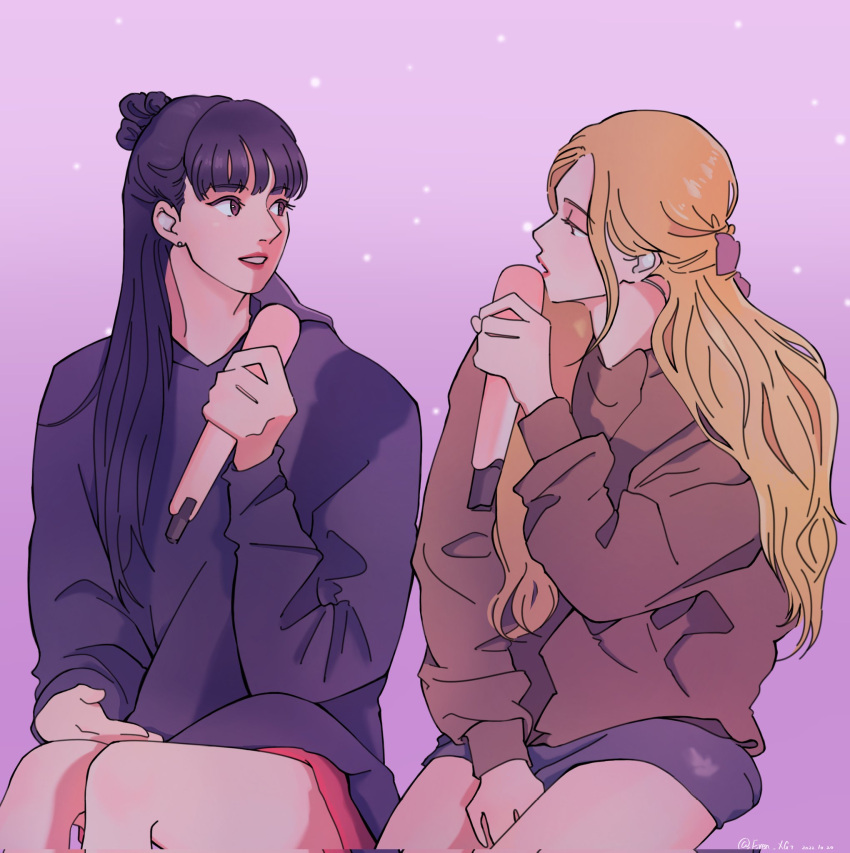 2girls black_hair blackpink blonde_hair blunt_bangs commentary eren_xg7 eye_contact hair_bun half_updo highres holding holding_microphone hood hoodie k-pop lisa_(blackpink) long_hair looking_at_another microphone multiple_girls real_life rose_(blackpink) simple_background