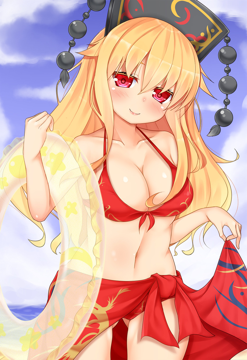 ass_visible_through_thighs bare_shoulders bikini black_hat blue_sky breasts cleavage closed_mouth cloud cowboy_shot day hair_between_eyes hat head_tilt highres holding innertube junko_(touhou) large_breasts lips long_hair looking_at_viewer navel ocean outdoors pom_pom_(clothes) red_bikini sarong sky smile solo standing stomach swimsuit tokoya_(ex-hetare) touhou transparent water