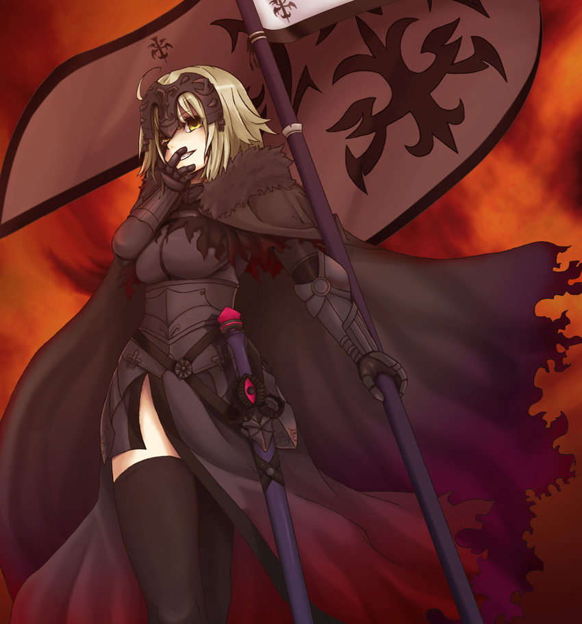 armor blonde_hair cape covering_mouth fate/grand_order fate_(series) hand_over_own_mouth headpiece highres jeanne_d'arc_(alter)_(fate) jeanne_d'arc_(fate)_(all) looking_at_viewer scabbard sheath sheathed shishamo_(1874486) smile smirk solo standard_bearer sword thighhighs thighs weapon yellow_eyes