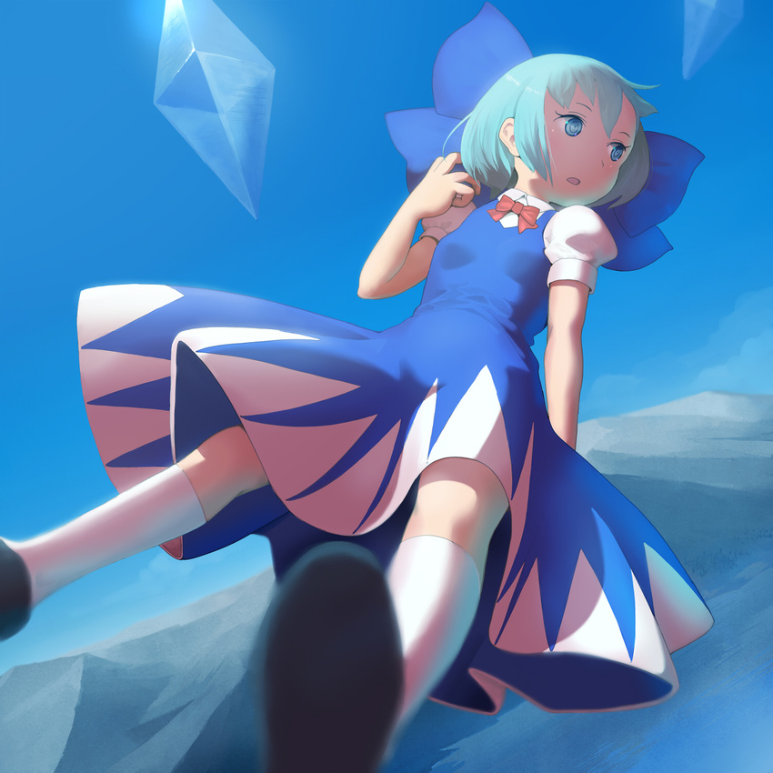 1girl blue_eyes blue_hair cirno depth_of_field detached_wings dress female foreshortening from_below hair_bow hasukawa_isaburou open_mouth outdoors puffy_short_sleeves short_hair solo touhou