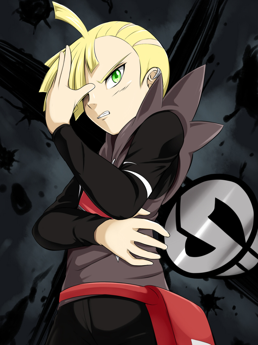 blonde_hair covering_face ear_piercing from_below gladio_(pokemon) green_eyes hair_over_one_eye highres male_focus piercing pokemon pokemon_(game) pokemon_sm pose short_hair team_skull teeth vest yomitrooper