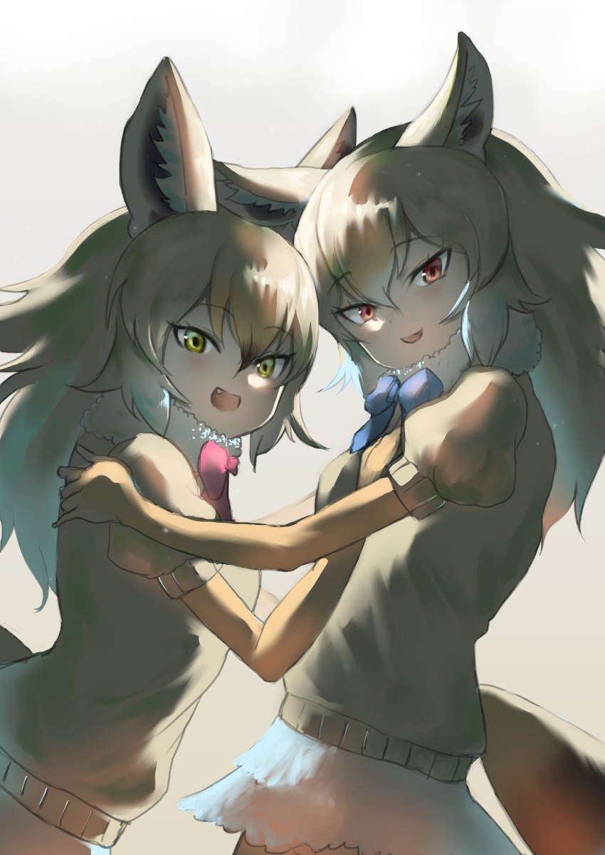 2girls african_golden_wolf_(kemono_friends) animal_ears blonde_hair bow bowtie cardigan elbow_gloves extra_ears gaga_(gamerakero) gloves golden_jackal_(kemono_friends) highres kemono_friends long_hair looking_at_viewer multiple_girls red_eyes simple_background skirt tail wolf_ears wolf_girl wolf_tail yellow_eyes