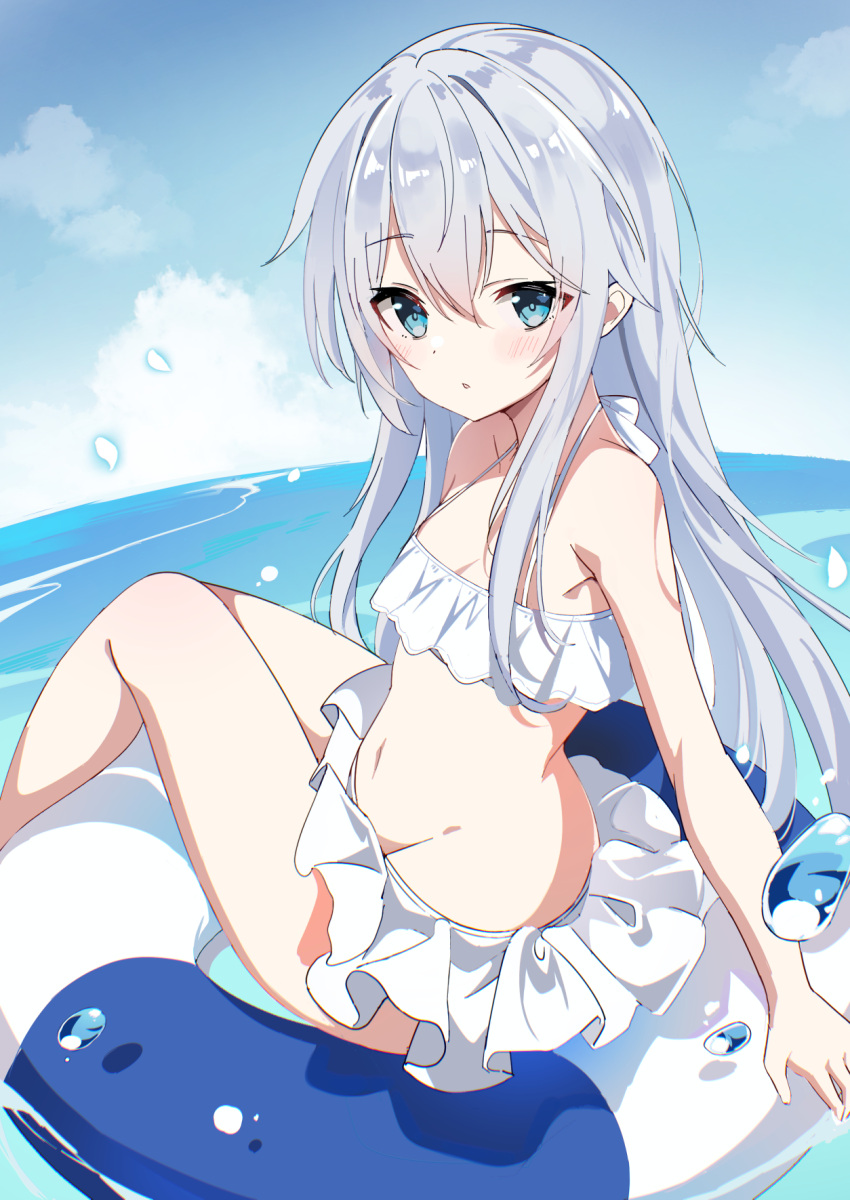 1girl alternate_costume bikini bikini_skirt blue_eyes blue_sky cloud day fathom frilled_bikini frills hibiki_(kancolle) highres horizon innertube kantai_collection looking_at_viewer ocean outdoors sky solo swim_ring swimsuit white_bikini white_hair