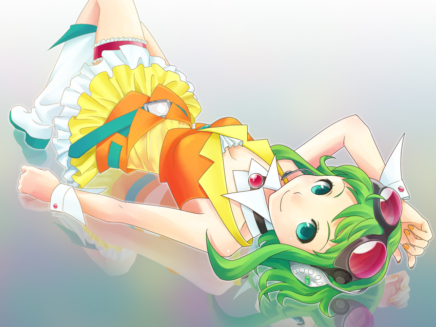 asami_(undoundo) boots goggles goggles_on_head green_eyes green_hair gumi highres lying midriff see-through short_hair smile solo vocaloid wrist_cuffs