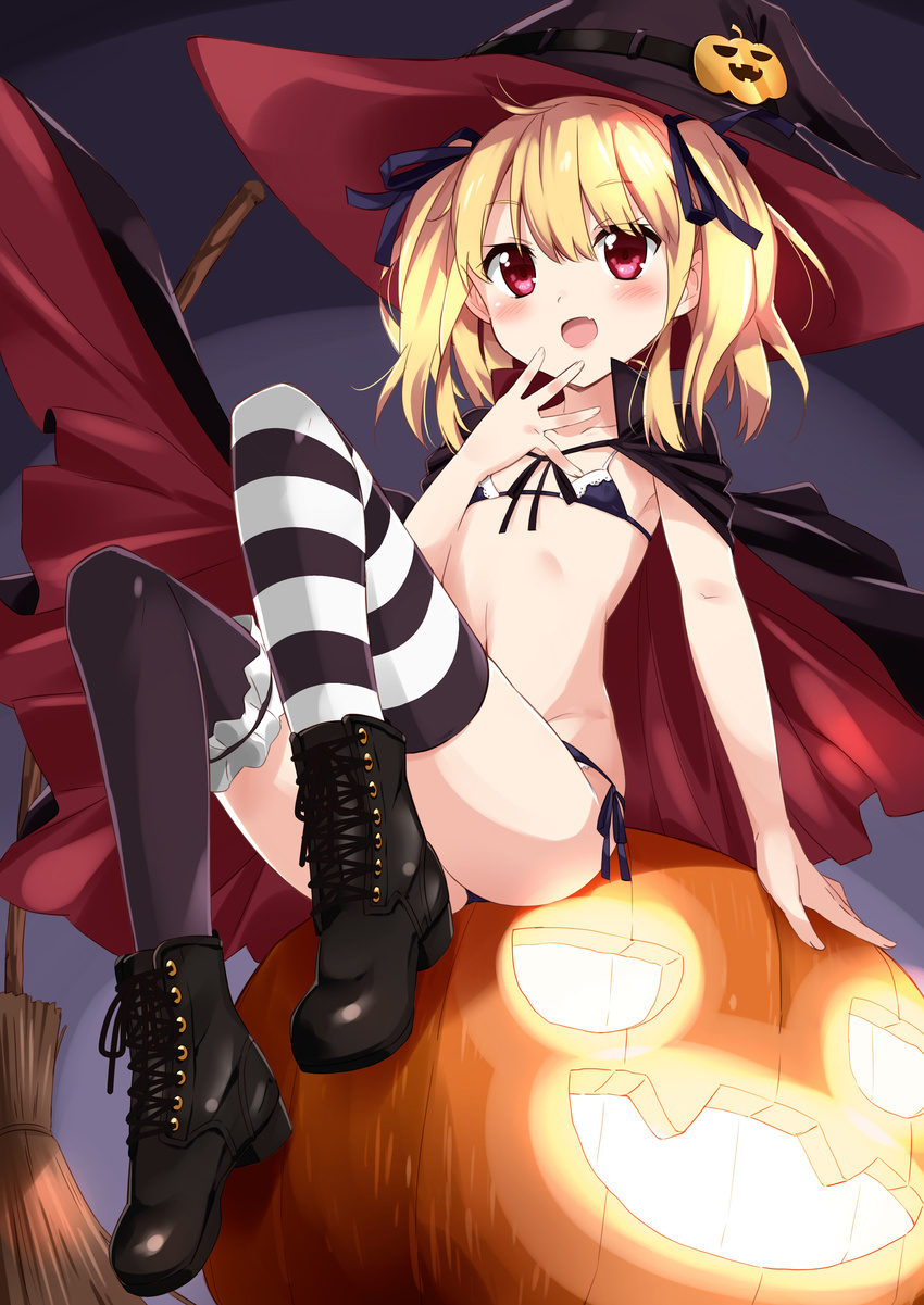 :d absurdres bikini black_bikini black_legwear blonde_hair blush boots cape fang hair_ribbon halloween hat hat_ornament highres jack-o'-lantern leg_garter micro_bikini mismatched_legwear mousou_(mousou_temporary) open_mouth original pumpkin red_eyes ribbon short_hair short_twintails side-tie_bikini sitting smile solo striped striped_legwear swimsuit thighhighs twintails witch_hat