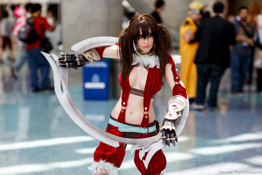 1girl breasts brown_hair cleavage cosplay eyeshadow feathers long_hair navel photo solo soul_calibur soulcalibur_iv standing tira_(soulcalibur) tira_(soulcalibur)_(cosplay) twintails