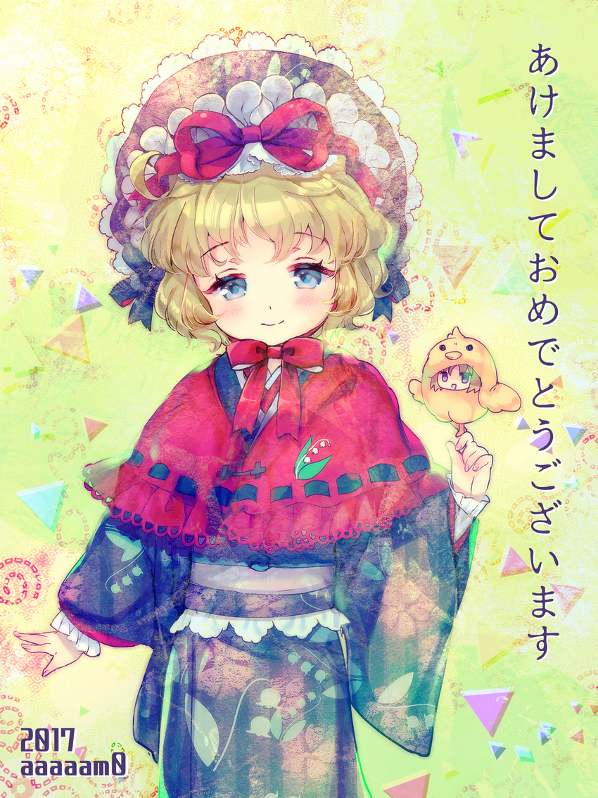 2017 adapted_costume amo artist_name black_kimono blonde_hair blue_eyes blush bonnet capelet chick_costume chin_strap commentary_request eyebrows_visible_through_hair floral_print happy_new_year highres japanese_clothes kimono long_sleeves looking_at_viewer medicine_melancholy new_year obi red_ribbon ribbon sash smile su-san touhou wide_sleeves