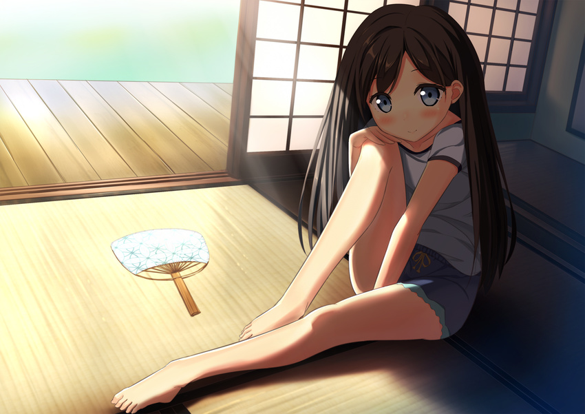 bangs blue_eyes blue_shirt blush brown_hair casual closed_mouth commentary_request eyebrows_visible_through_hair fan full_body highres indoors kantoku_(style) legs light_rays long_hair looking_at_viewer original paper_fan plantar_flexion porch shade shirt short_sleeves shorts sliding_doors smile solo sora46 sunlight t-shirt tatami uchiwa