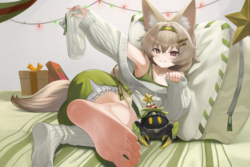 1girl animal_ear_fluff animal_ears arknights bare_shoulders barefoot beanstalk_(arknights) beanstalk_(gift_uncompleted)_(arknights) christmas_present dokomon feet foot_focus foreshortening fox_ears fox_tail gift green_nails grin hair_ornament hairband hairclip highres holding_sock looking_at_viewer metal_crab_(arknights) nail_polish no_shoes off-shoulder_sweater off_shoulder official_alternate_costume red_nails smile socks soles solo sweater tail toes two-tone_nails unworn_socks white_sweater