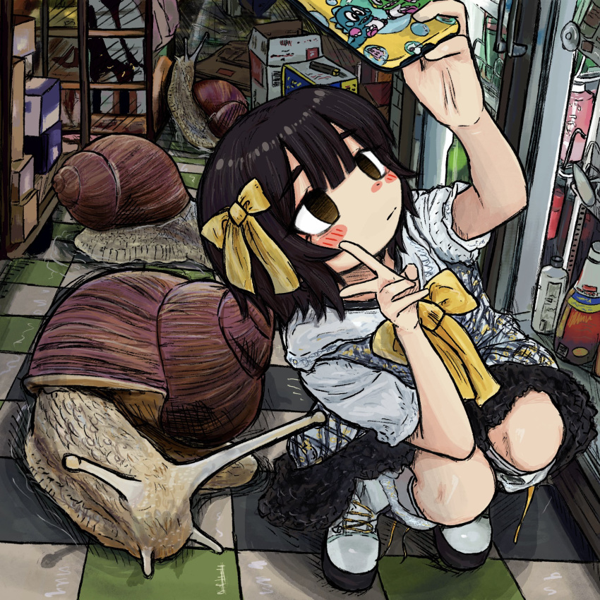 1girl black_hair blush bottle bow box brown_eyes bubbacterial bubble_bobble cardboard_box cellphone closed_mouth hair_bow highres indoors original phone selfie shoes short_sleeves smartphone smartphone_case snail solo squatting_cowgirl_position v white_footwear yellow_bow