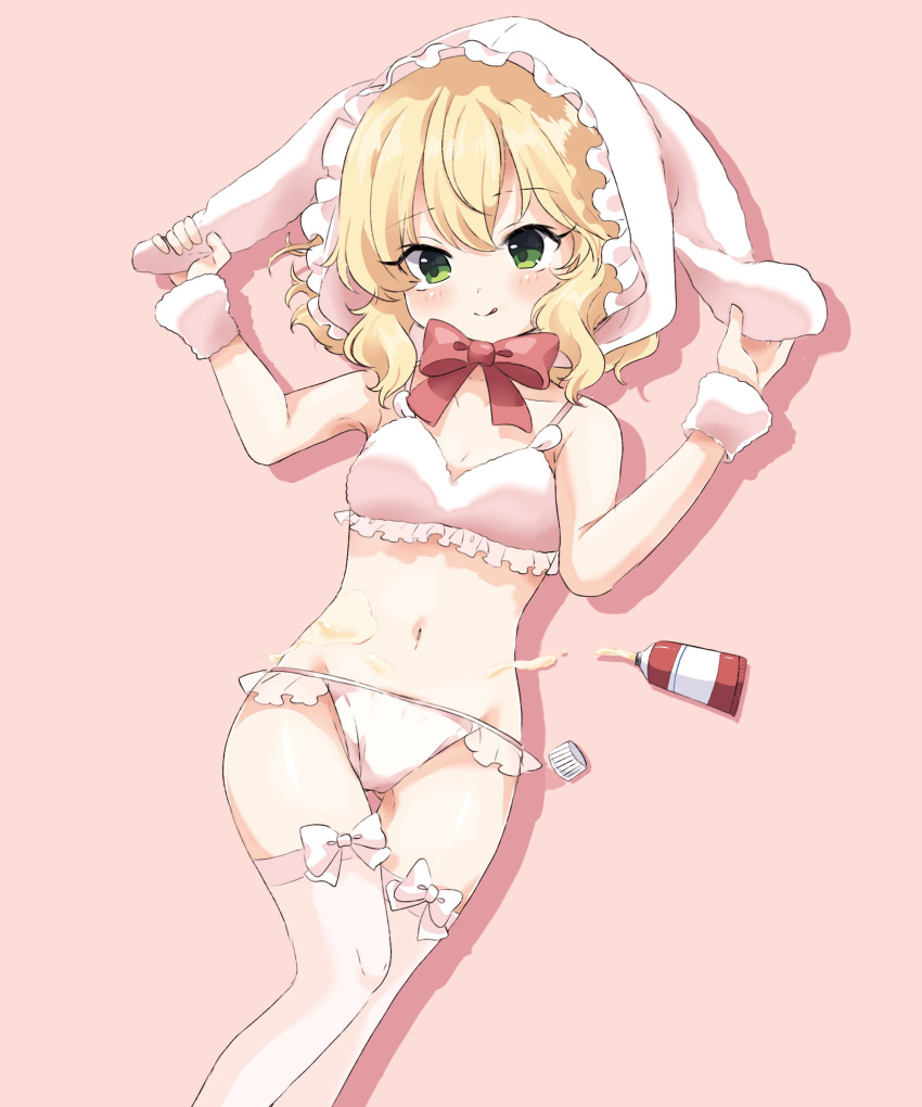 1girl absurdres animal_hood blonde_hair blush bow bowtie bra breasts cleavage commentary food_on_body frilled_bra frilled_hood frilled_panties frills green_eyes hair_between_eyes hands_up highres hood idolmaster idolmaster_cinderella_girls legs looking_at_viewer lying medium_hair navel panties pink_background pink_bow pink_bra pink_hood pink_panties pink_thighhighs pink_wristband rabbit_hood red_bow red_bowtie remiri_nicoeli sakurai_momoka sidelocks small_breasts smile solo stomach thighhighs thighs tongue tongue_out underwear wavy_hair whipped_cream