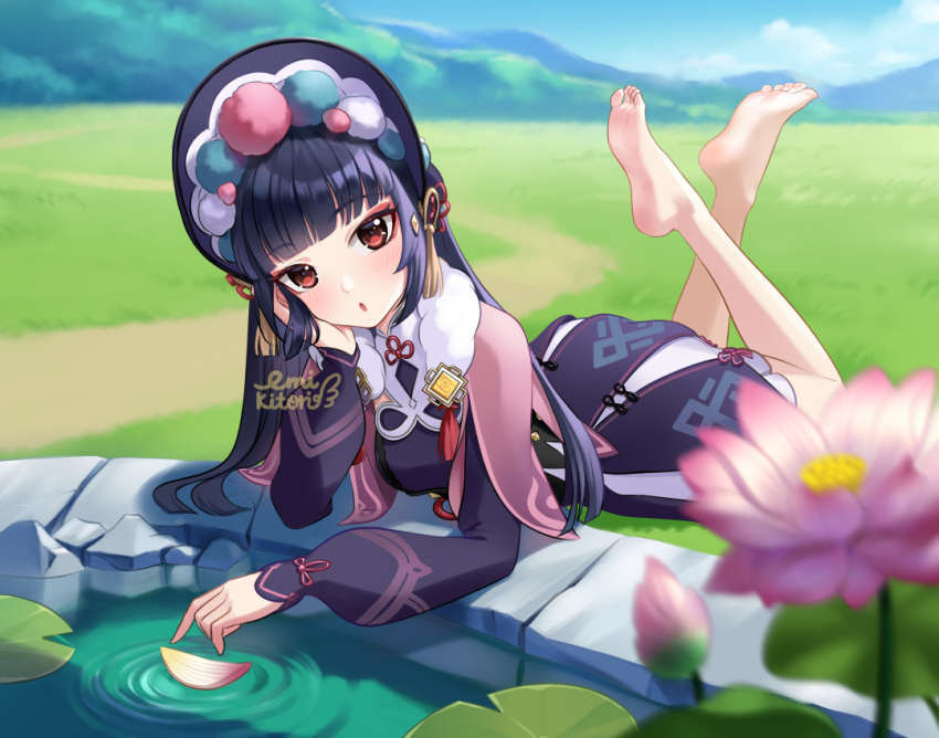 1girl barefoot black_hair blurry blurry_foreground blush bonnet brown_eyes capelet day flower fur_collar genshin_impact grass hand_on_own_cheek hand_on_own_face leaf_on_liquid lilia_creative lily_pad long_hair long_sleeves looking_at_viewer lotus lying on_stomach open_mouth outdoors pond ripples skirt sky soles solo the_pose toes very_long_hair water yun_jin_(genshin_impact)