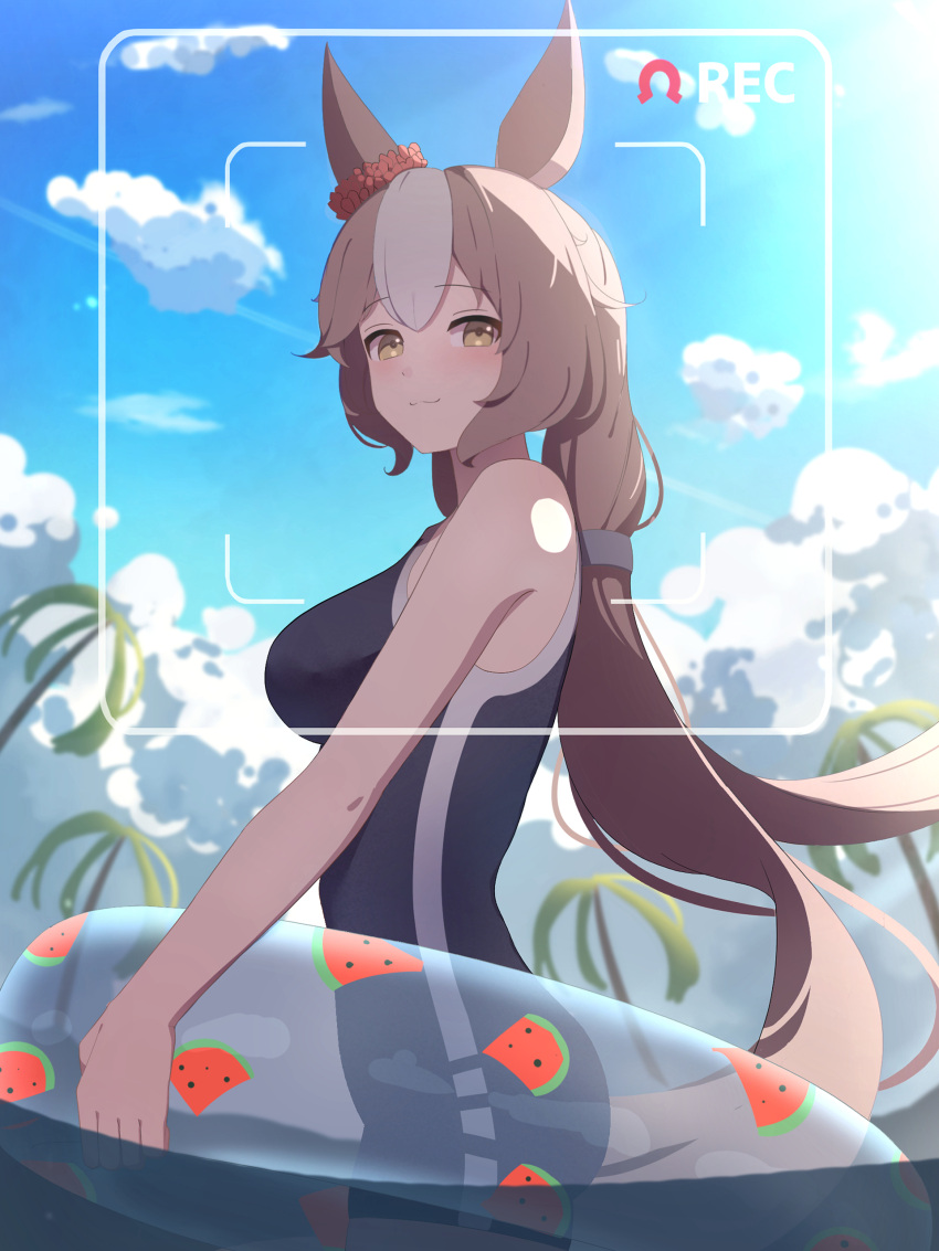 1girl absurdres alternate_costume animal_ears blush breasts brown_eyes brown_hair cloud commentary_request hair_between_eyes hair_ornament highres horse_ears horse_girl innertube long_hair looking_at_viewer low_twintails medium_breasts palm_tree recording school_swimsuit smile swim_ring swimsuit tokutokenzen tracen_swimsuit tree twintails umamusume yamanin_zephyr_(umamusume)