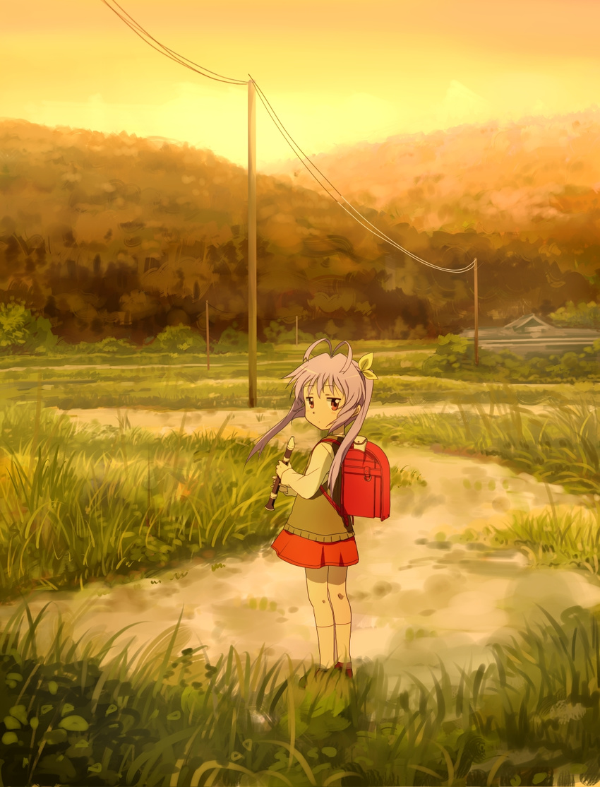 ahoge antenna_hair backpack bag blush_stickers child expressionless eyebrows_visible_through_hair forest from_side grass ground hair_ornament hair_ribbon highres holding holding_instrument hotate_(suikaneko) instrument instrument_case jitome landscape lavender_hair loafers long_sleeves looking_at_viewer looking_back miyauchi_renge nature non_non_biyori orange_sky outdoors post randoseru recorder red_eyes ribbon scenery shirt shoes skirt sky socks solo standing telegraph_lines telephone_pole tree twintails vest wide_shot