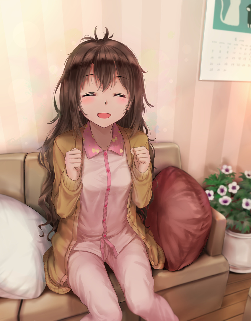 ^_^ absurdres blurry brown_hair calendar_(object) cardigan clenched_hands closed_eyes couch depth_of_field eyebrows_visible_through_hair facing_viewer flower flower_pot highres idolmaster idolmaster_cinderella_girls indoors kachayori long_hair messy_hair open_mouth pajamas pillow shimamura_uzuki sitting smile solo wooden_floor