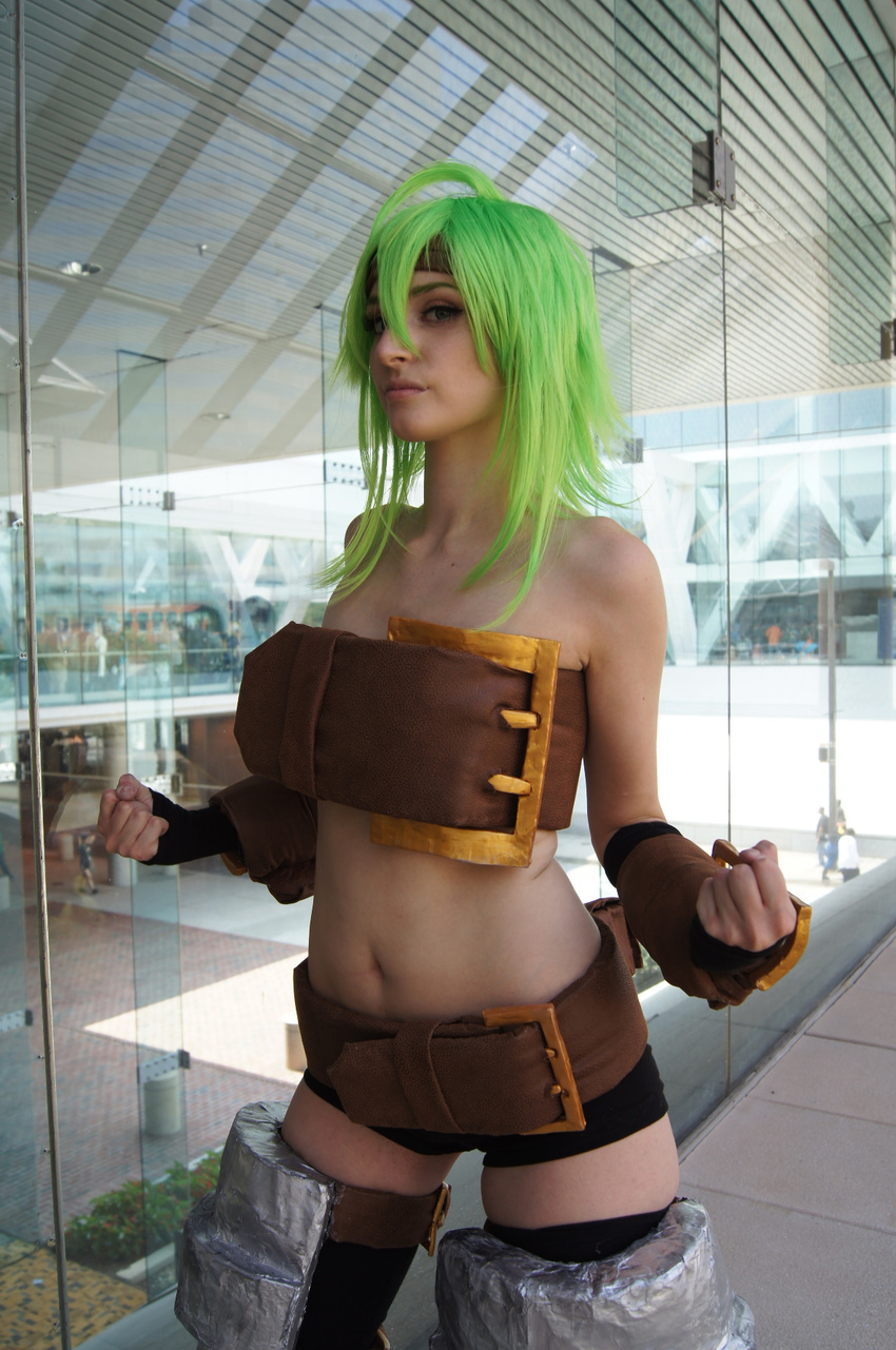 1girl ahoge cosplay disgaea female_warrior_(disgaea) green_hair photo short_hair