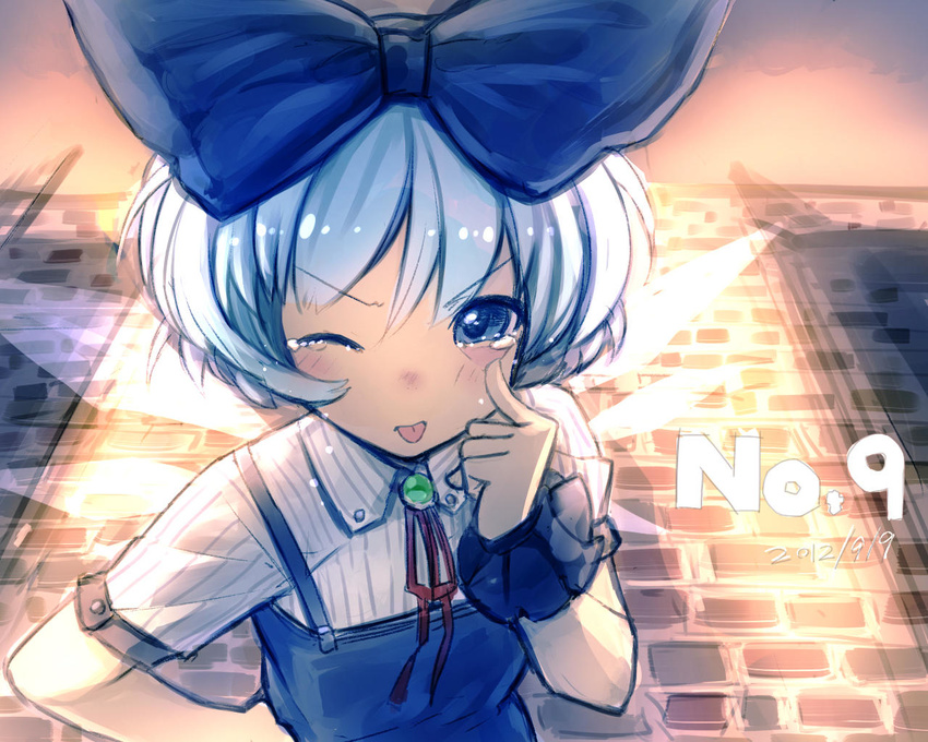 2012 akanbe blue_eyes blue_hair blush bow cirno dated hair_bow hand_on_hip ice ice_wings kurobuta_gekkan looking_at_viewer one_eye_closed short_hair solo tears tongue tongue_out touhou wings wrist_cuffs