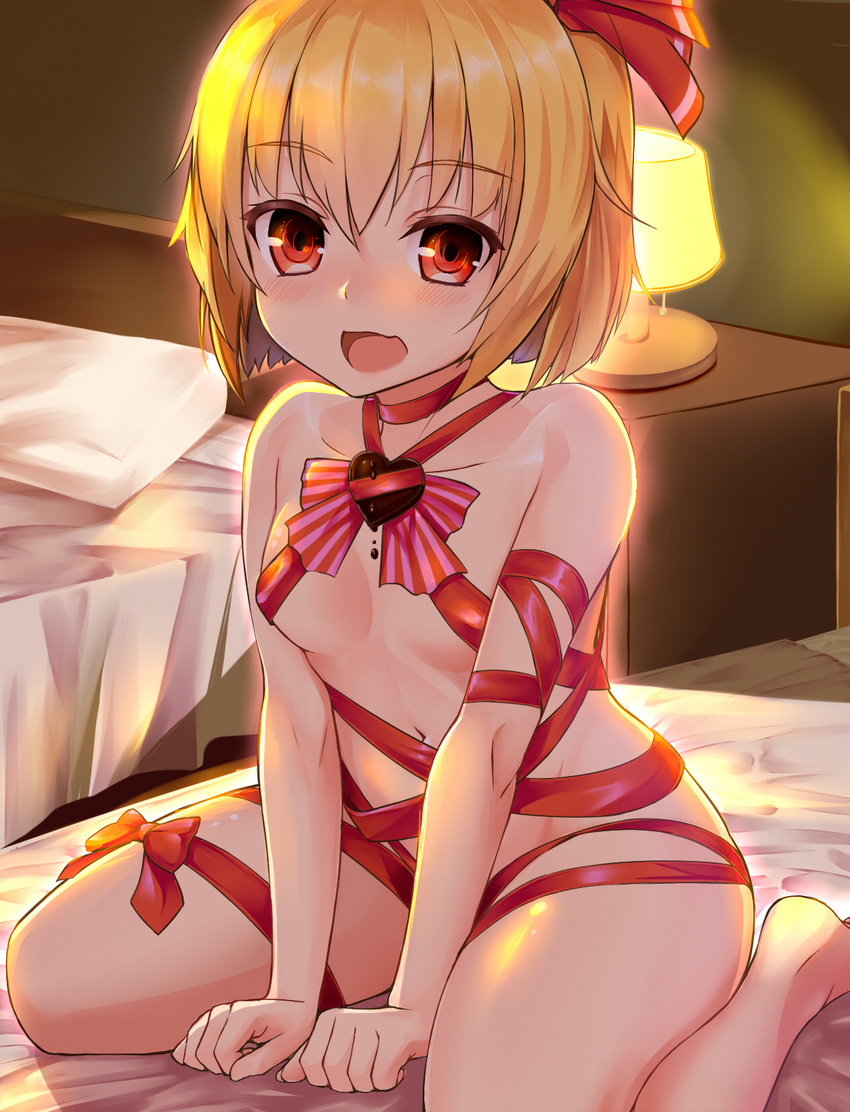 bangs bed bed_sheet blonde_hair breasts chocolate chocolate_heart collarbone hair_ribbon heart highres lamp looking_at_viewer naked_ribbon on_bed pillow red_eyes red_ribbon ribbon rumia shiron_(e1na1e2lu2ne3ru3) short_hair sitting small_breasts smile solo touhou wariza